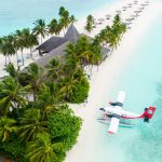 Pálmafák és hidroplán Maldiv-szigetek
